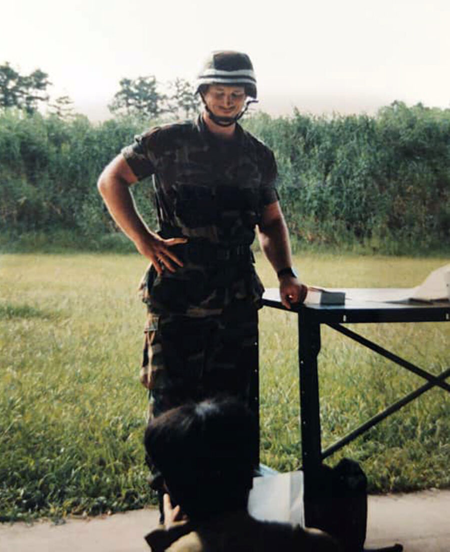 C.L. Stegall training troops at the range with an MI battalion